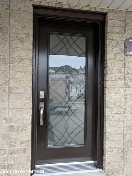 Front door ideas. Single entry insulated steel exterior. Brown. Oak Ridge popular iron design glass